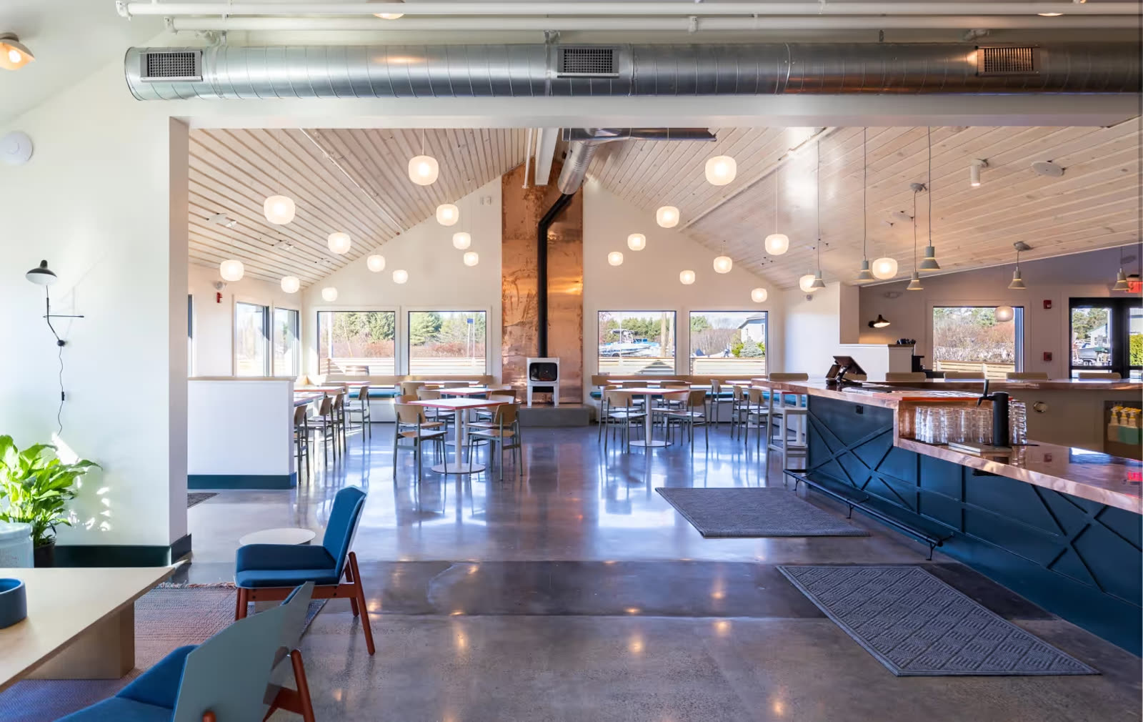 Lounge seating area with large windows