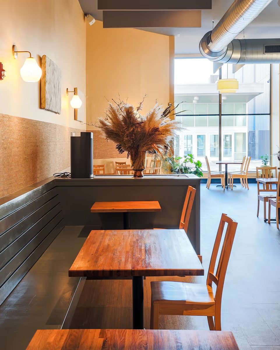 Dining room banquette and tables at Leeward