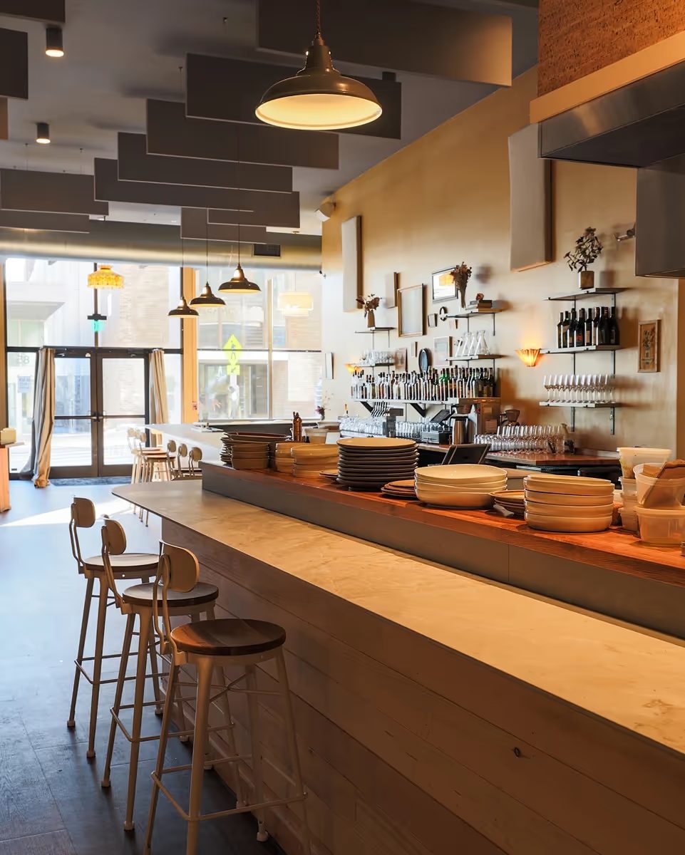 Kitchen pass and counter seating at Leeward