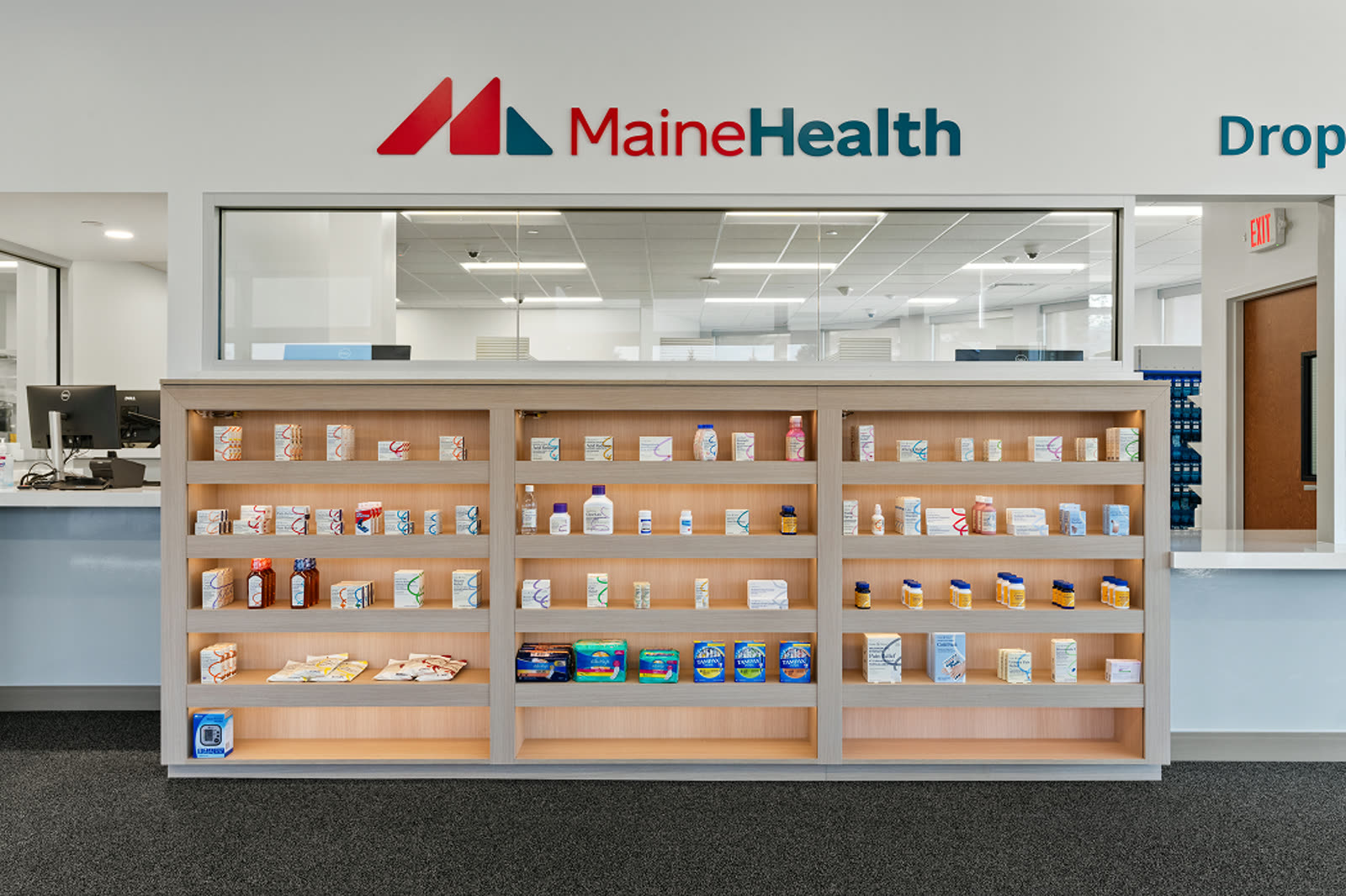 Retail pharmacy service counter at MaineHealth in Portland