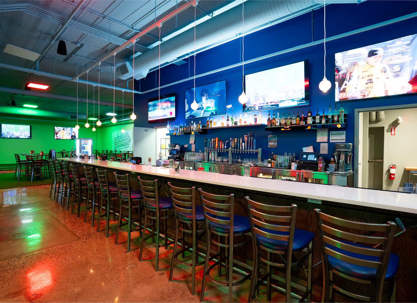 Dining area with televisions at Minibar