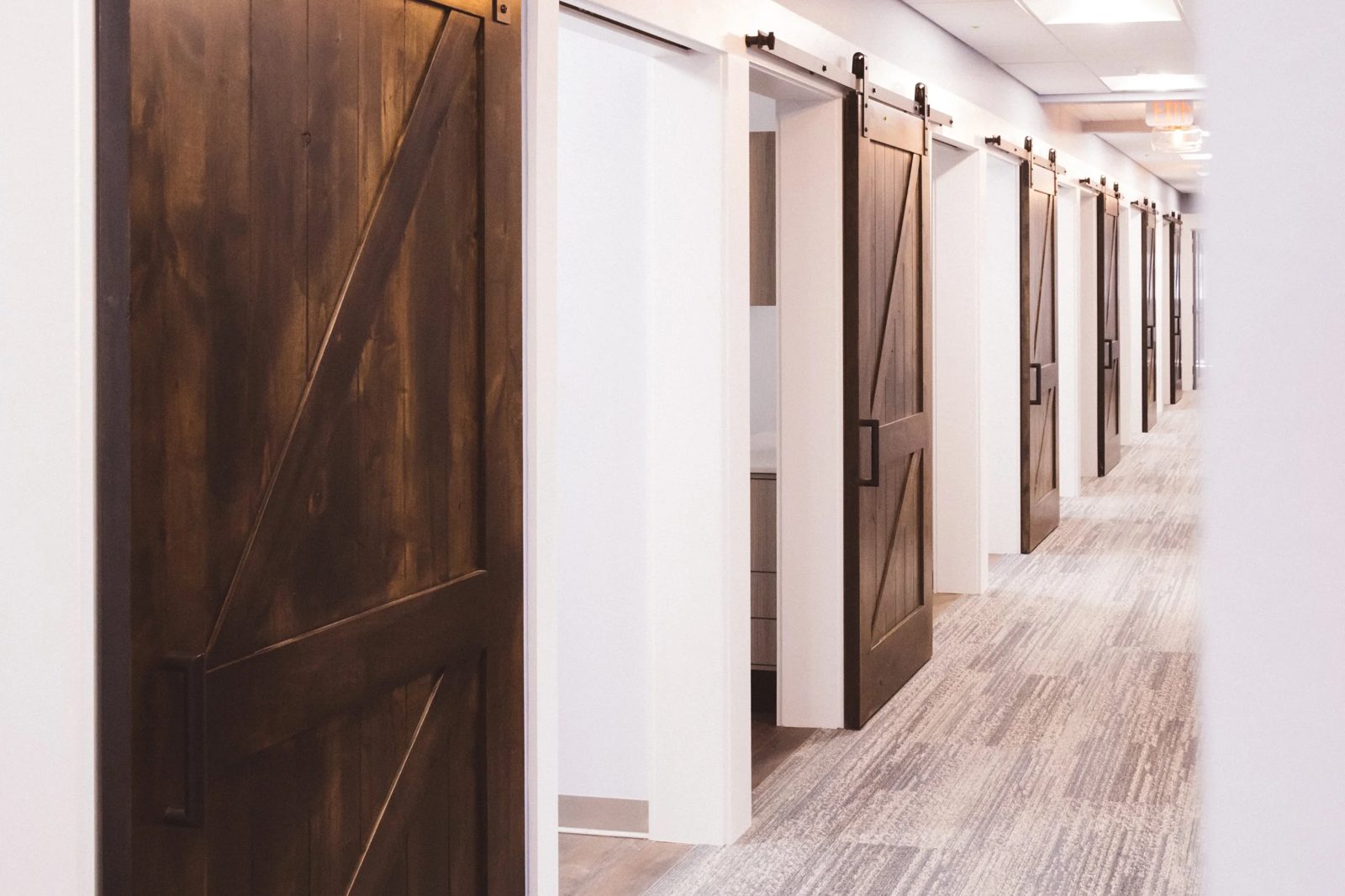 Sliding barn doors along the operatory corridor