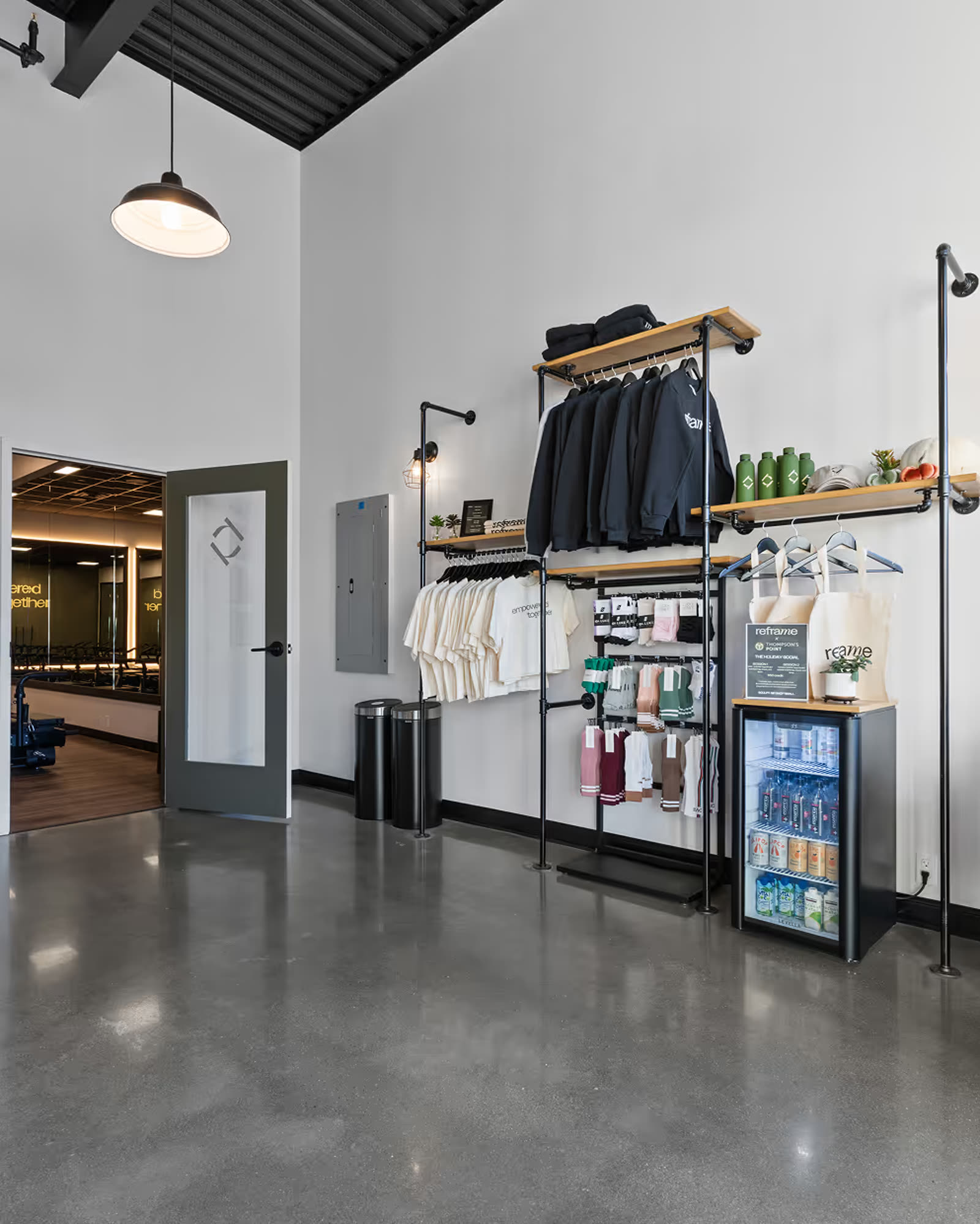 Retail and check-in counter at Reframe Pilates