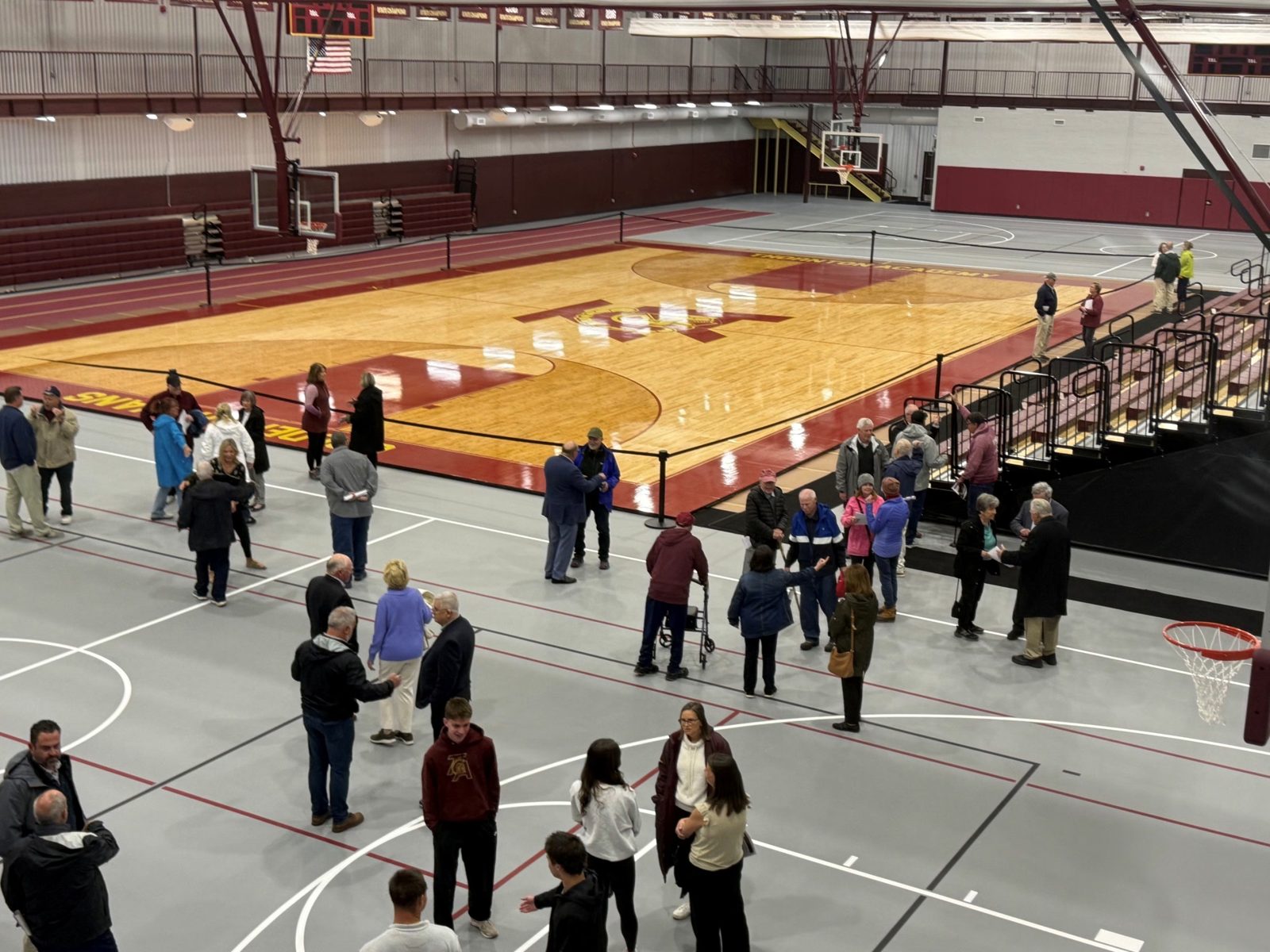Gymnasium seating and court at Miles Field House