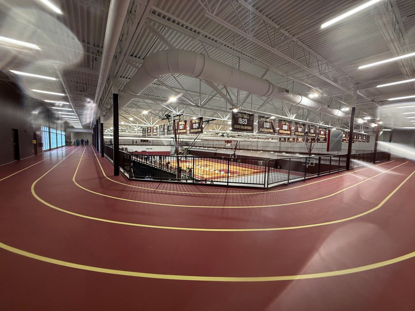 Track level view with overhead mechanical systems